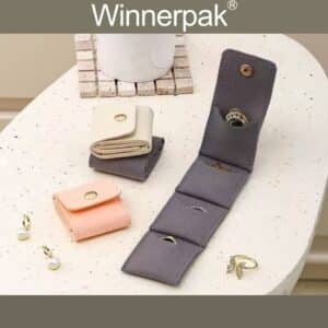 Mini foldable jewelry organizer pouches in grey and pink